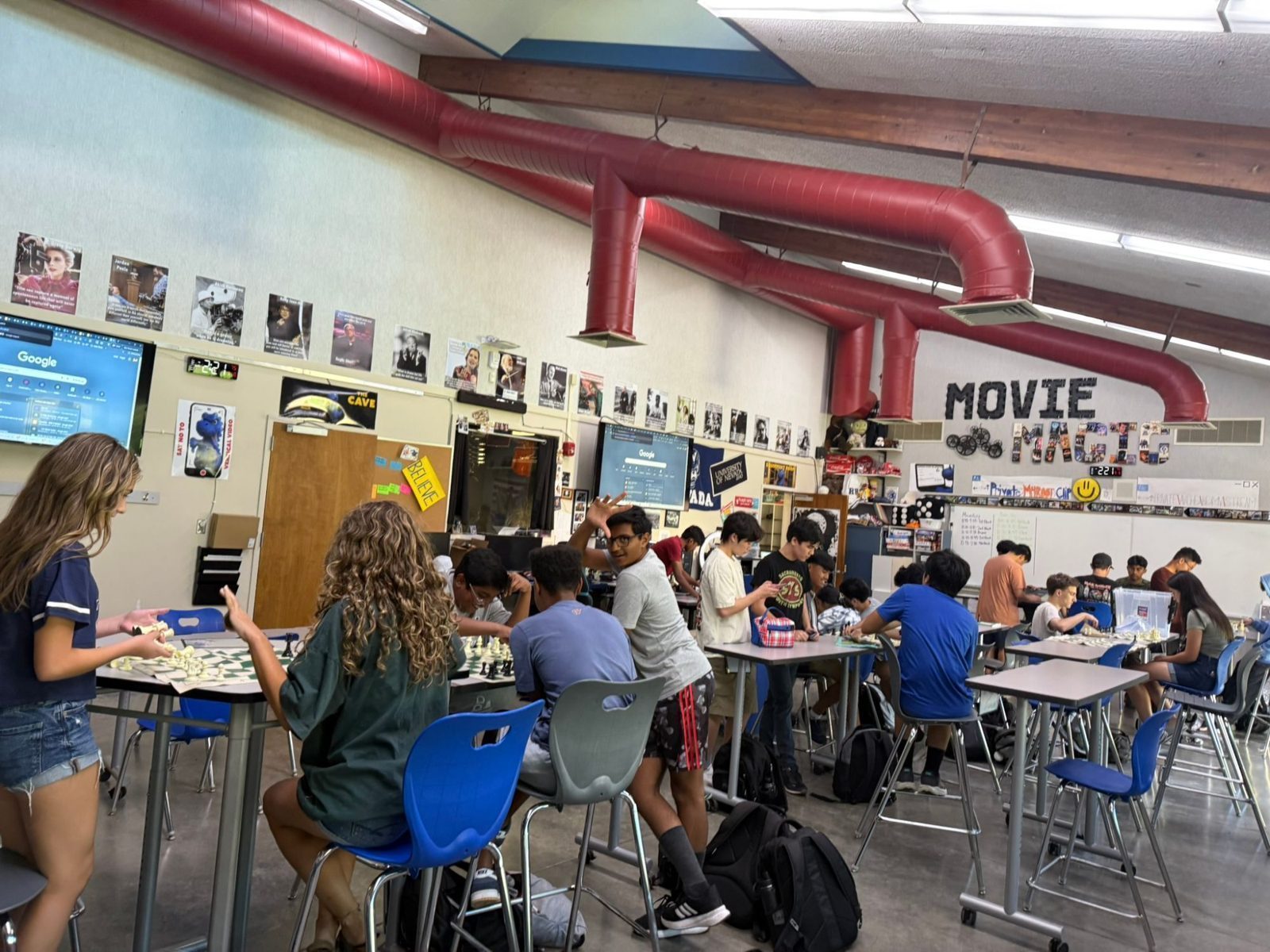 Rocklin High School chess club members playing at tables during a club meeting